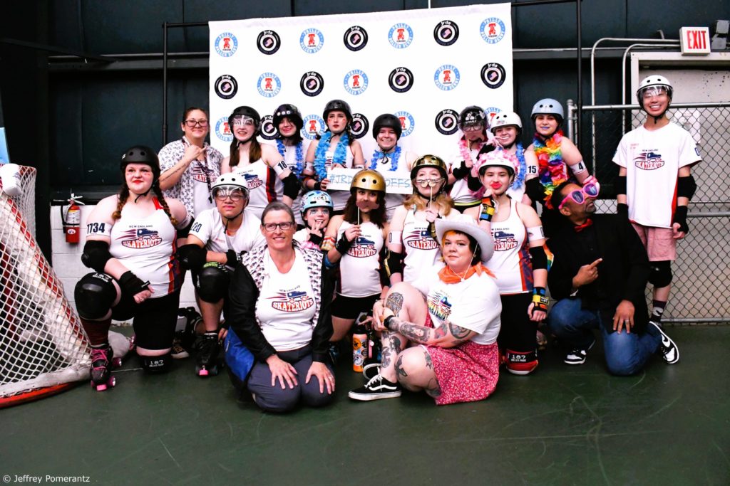 Photo of the Skateriots team with their coaches